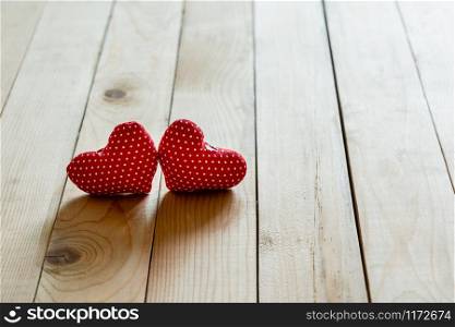 Accessories of decorations valentine&rsquo;s day holiday background concept.Essential item colorful red love couple shape on modern rustic wooden wallpaper.blank space for mock up creative design.