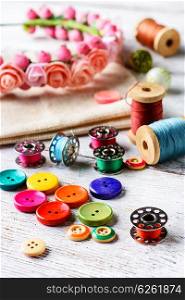 Accessories seamstress and needlework. Beads and thread working tools for craft and skill