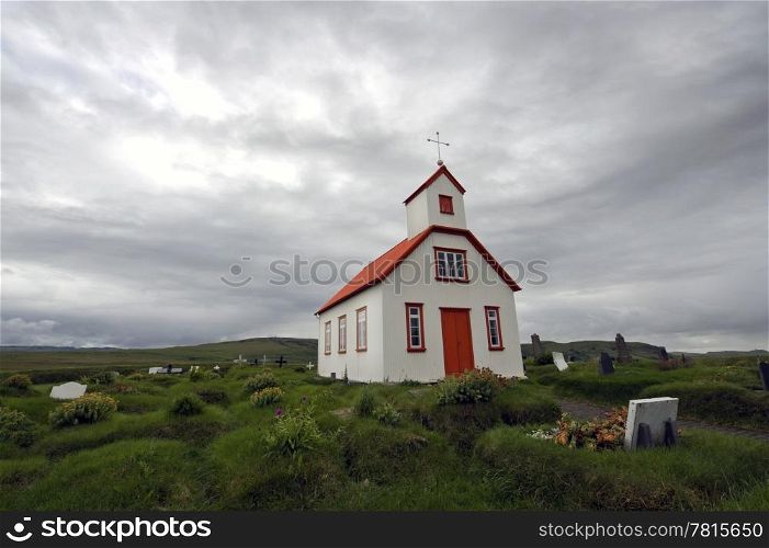 According to Icelandic tradition, Christianity and the belief in the Saga go hand in hand; the wooden churches, surrounded by graves, together with the gloomy weather sketch this feeling of religion