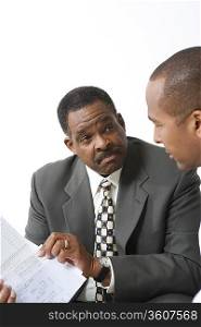 Accountant and Client Going over Bills