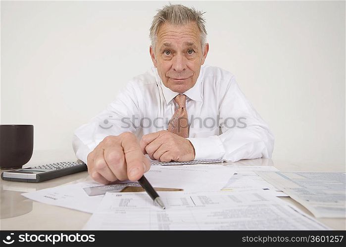 Accountant Pointing to Bottom Line
