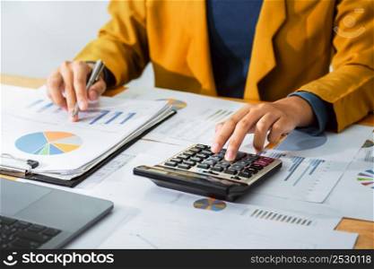 accounting concept. businesswoman working using calculator in office