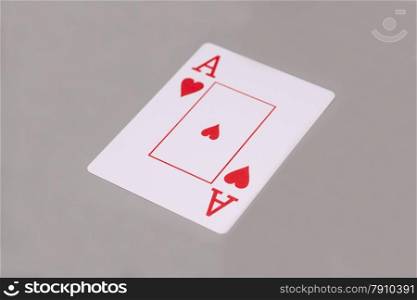 ace playing card on gray background