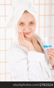 Acne facial care teenager woman clean skin in bathroom