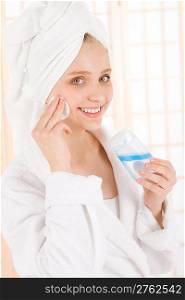 Acne facial care teenager woman clean skin in bathroom
