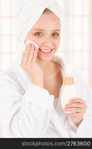 Acne facial care teenager woman clean skin in bathroom