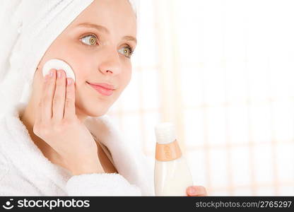 Acne facial care teenager woman clean skin in bathroom