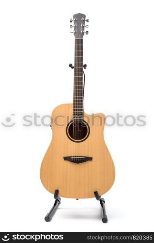 acoustic guitar with stand isolated on white background