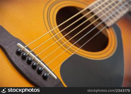 Acoustic guitar with very shallow depth of field