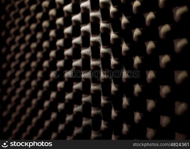 acoustic materials, texture and soundproofing concept - foam rubber surface at sound recording studio