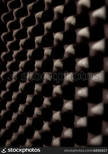 acoustic materials, texture and soundproofing concept - foam rubber surface at sound recording studio