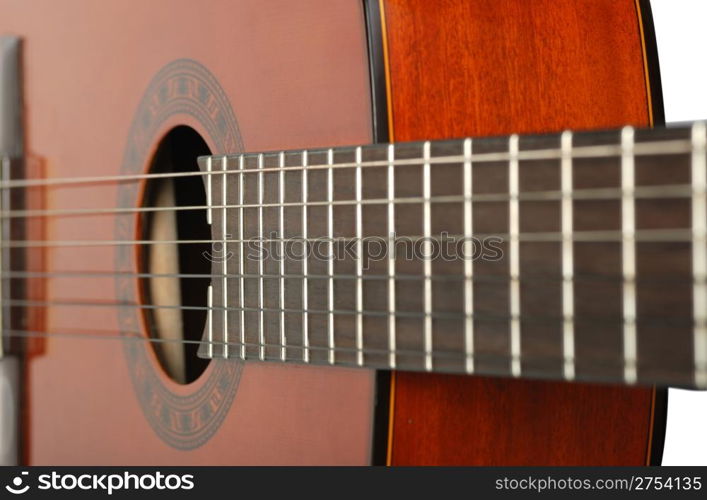 Acoustic six-string guitar. Covered by a brown varnish