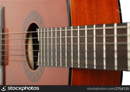 Acoustic six-string guitar. Covered by a brown varnish