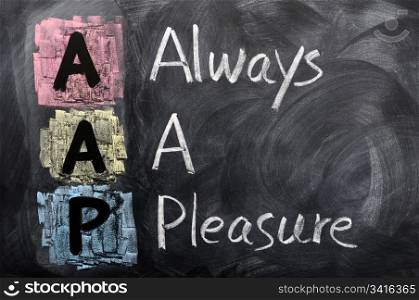 Acronym of AAP for Always a Pleasure written in chalk on a blackboard