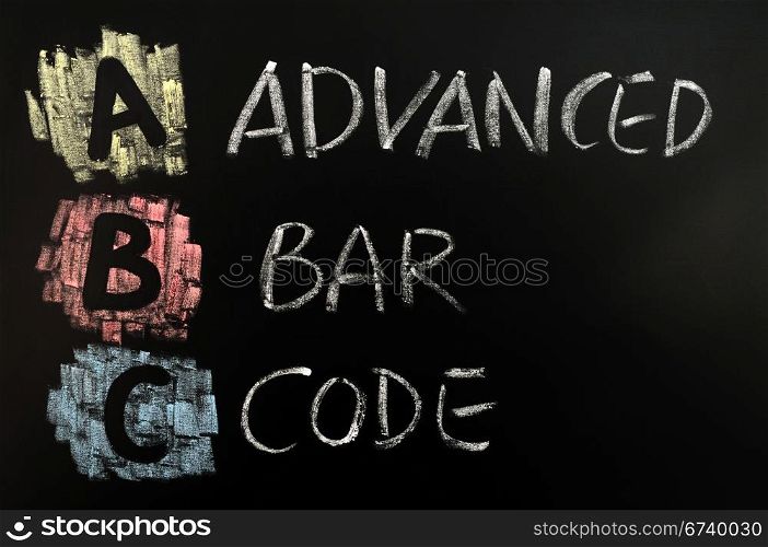 Acronym of ABC written in colorful chalk on a blackboard