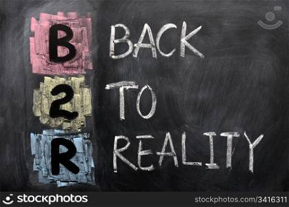 Acronym of B2R - Back to Reality written on a blackboard