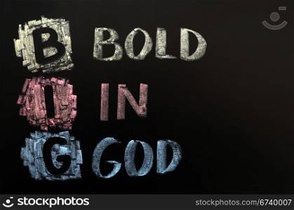 Acronym of BIG - Bold in God written on a blackboard