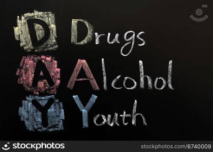 Acronym of DAY - Drugs, Alcohol, Youth written on a blackboard