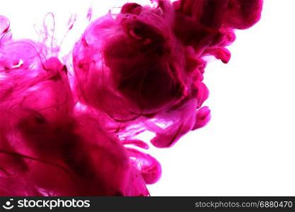 Acrylic colors and ink in water. Abstract background. Isolated on white.