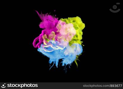 Acrylic colors in water. Ink blot. Abstract background. Isolated on black.