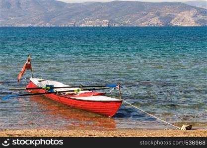 Active lifestyle sport concept. Canoe outdoor on sea shore in summer time. Blue water sunny day.. Canoe kayak on sea shore