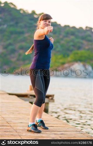 active sports activities, woman athlete at dawn