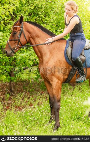 Active woman girl jockey training riding horse. Equitation sport competition and activity.. Woman jockey training riding horse. Sport activity