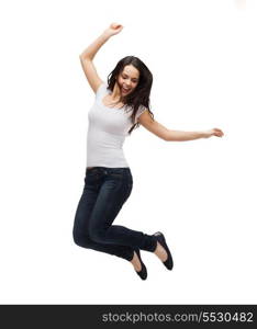 activity and happiness concept - smiling teenage girl in white blank t-shirt jumping