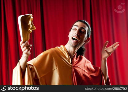 Actor with maks in a funny theater concept