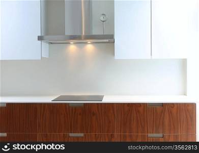 Actual modern kitchen in white and walnut wood interior house