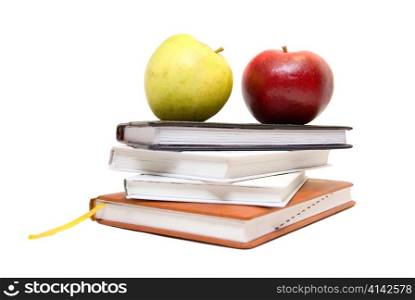 &acute;Back to school&acute; concept with books and apples on white