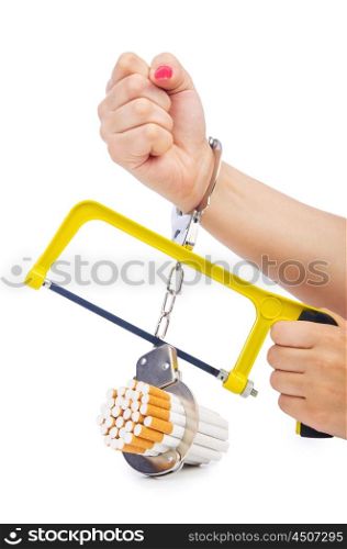 Addiction concept with cigarettes and handcuffs