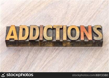 addictions word abstract in vintage letterpress wood type printing blocks