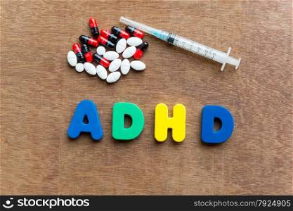 adhd colorful word in the wooden background
