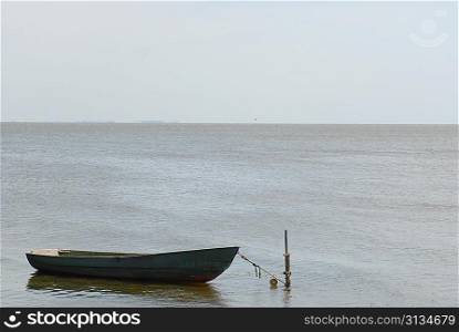 adhered boat in sea