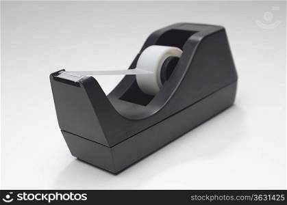 Adhesive tape with dispenser