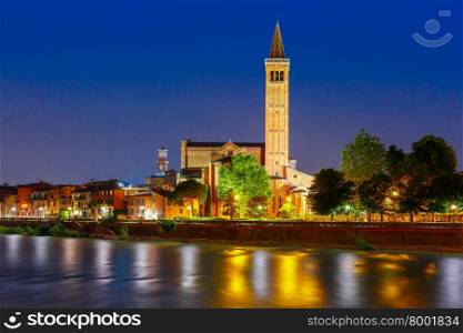 Adige River Embankment and Santa Anastasia Church at night illumination, Verona, Italy
