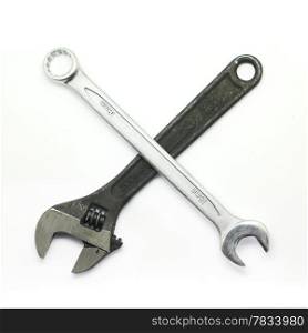 Adjustable wrench and wrench isolated on white background