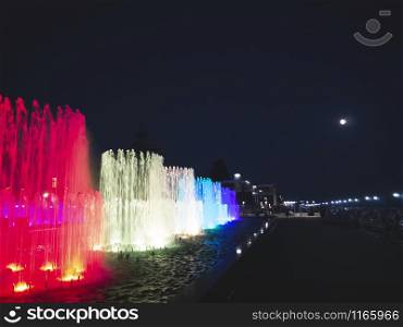 Adler/Russia - August 2019: Multi-colored singing fountains on the promenade of Adler city