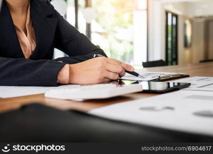 Administrator business man financial inspector and secretary making report, calculating balance. Internal Revenue Service checking document. Audit concept