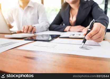 Administrator business man financial inspector and secretary making report, calculating balance. Internal Revenue Service checking document. Audit concept