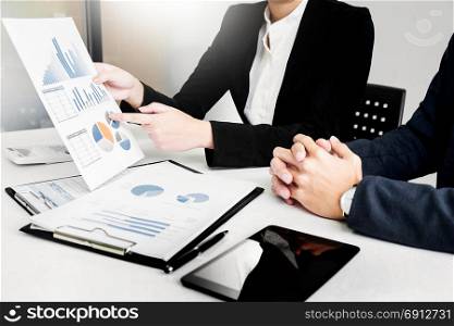 Administrator business man financial inspector and secretary making report, calculating balance. Internal Revenue Service checking document. Audit concept.