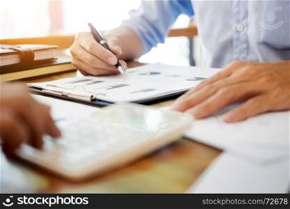 Administrator business man financial inspector and secretary making report, calculating balance. Internal Revenue Service checking document. Audit concept