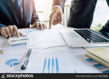 Administrator business man financial inspector and secretary making report, calculating or checking balance. Internal Revenue Service inspector checking document. Audit concept.