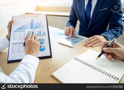 Administrator business man financial inspector and secretary making report, calculating or checking balance. Internal Revenue Service inspector checking document. Audit finance concept.