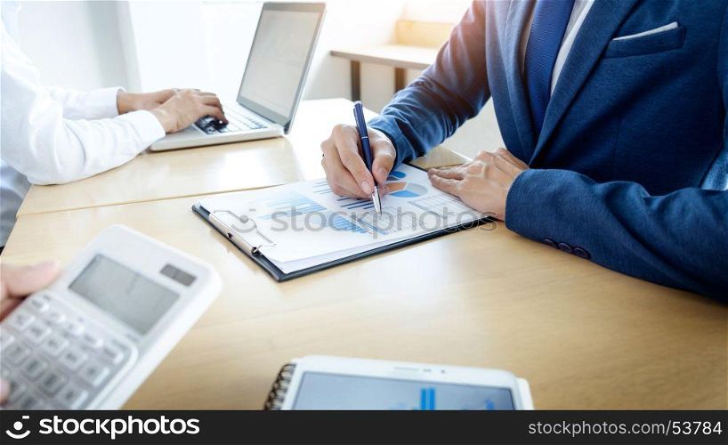 Administrator business man financial inspector and secretary making report, calculating or checking balance. Internal Revenue Service inspector checking document. Audit finance concept.