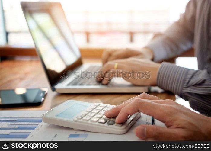 Administrator business man financial inspector and secretary making report, calculating or checking balance. Internal Revenue Service check document. Audit concept.
