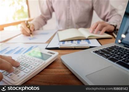 Administrator business man financial inspector and secretary making report, calculating or checking balance. Internal Revenue Service check document. Audit concept.