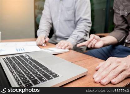 Administrator business man financial inspector and secretary making report, calculating or checking balance. Internal Revenue Service inspector checking document. Audit concept.
