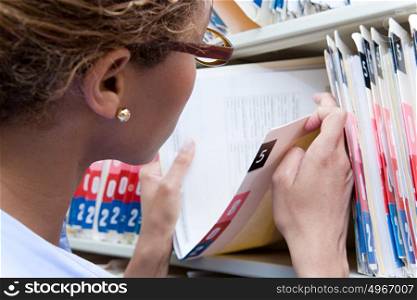 Administrator looking at medical record